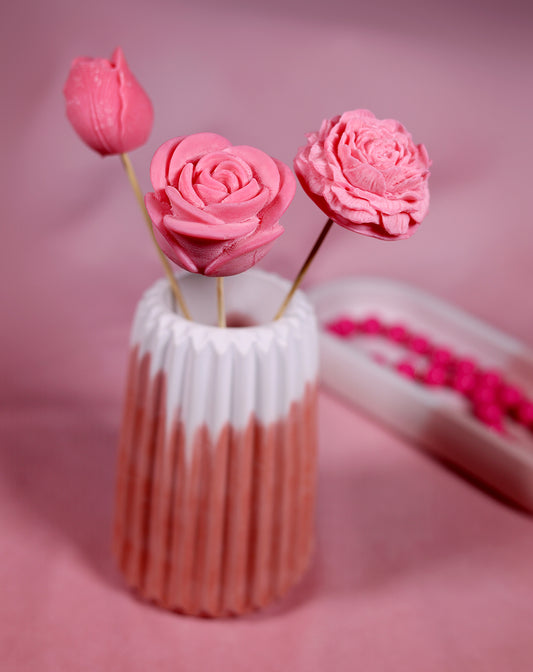 Fleurs de cire roses