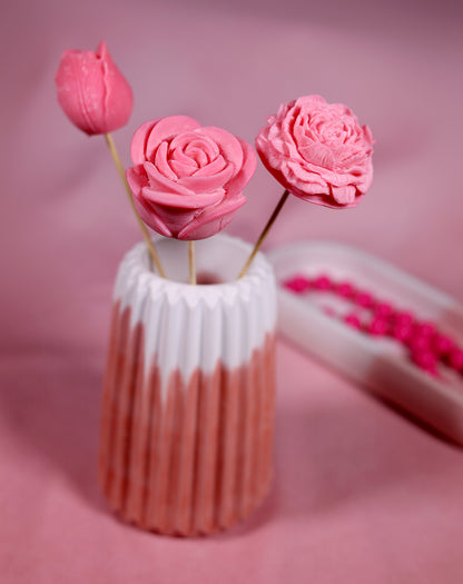 Fleurs de cire roses